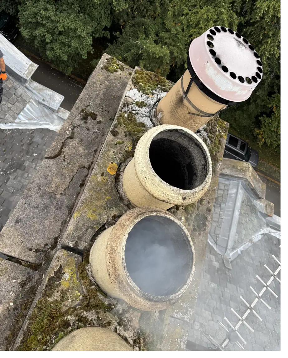 Smoke draw test seen from above the chimney pots